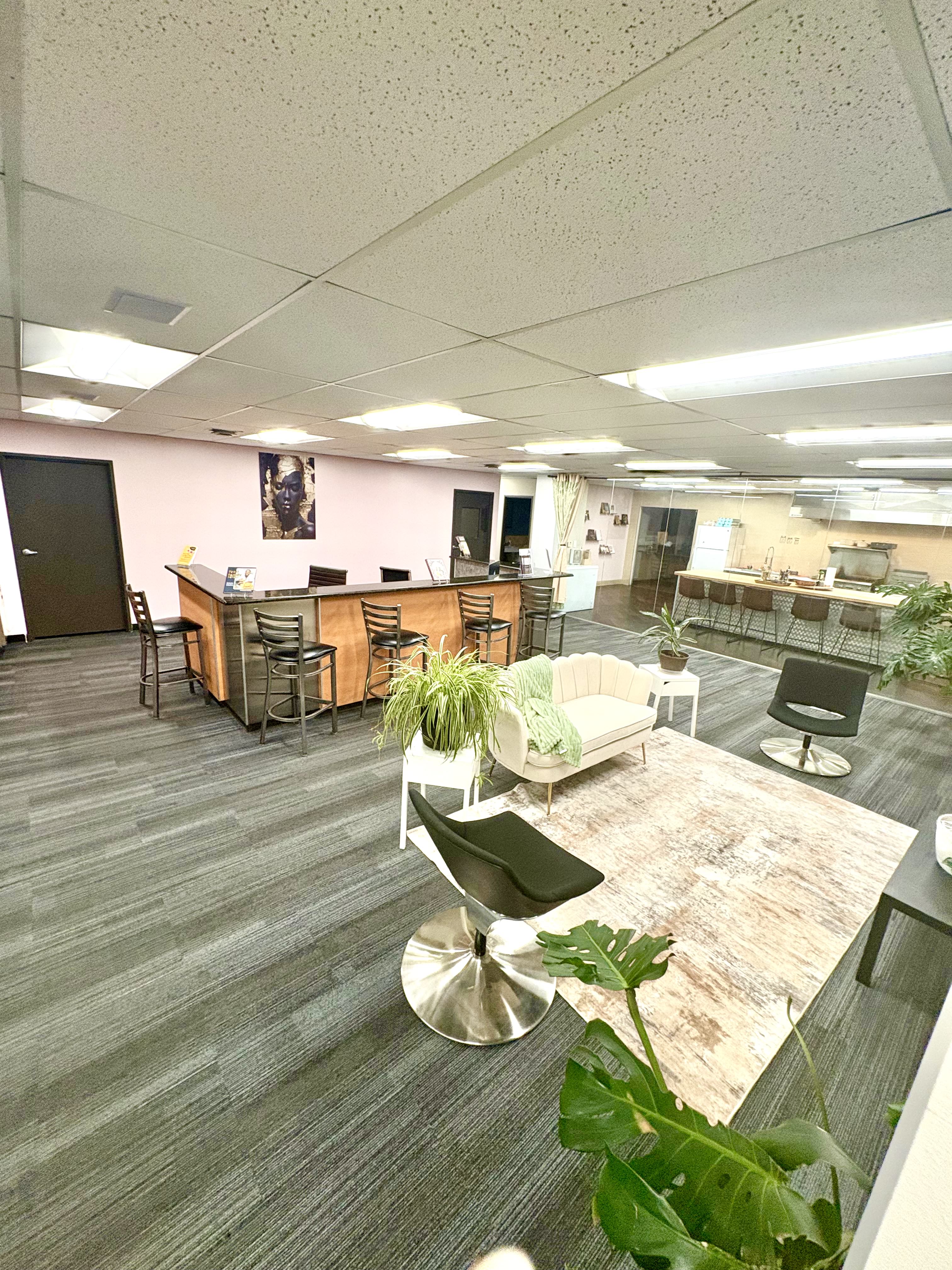 Brown Rice Consortium modern lounge area with bar seating and contemporary decor in Denver Colorado